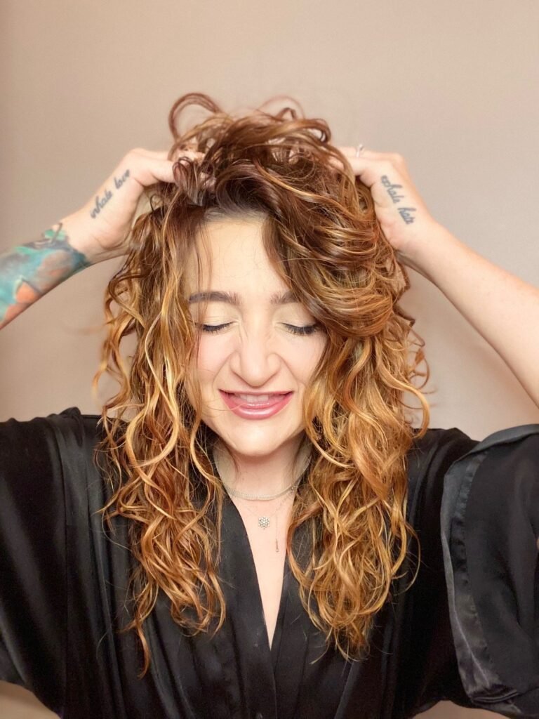 Portrait of Victoria Cordeiro, owner of The House of Curls